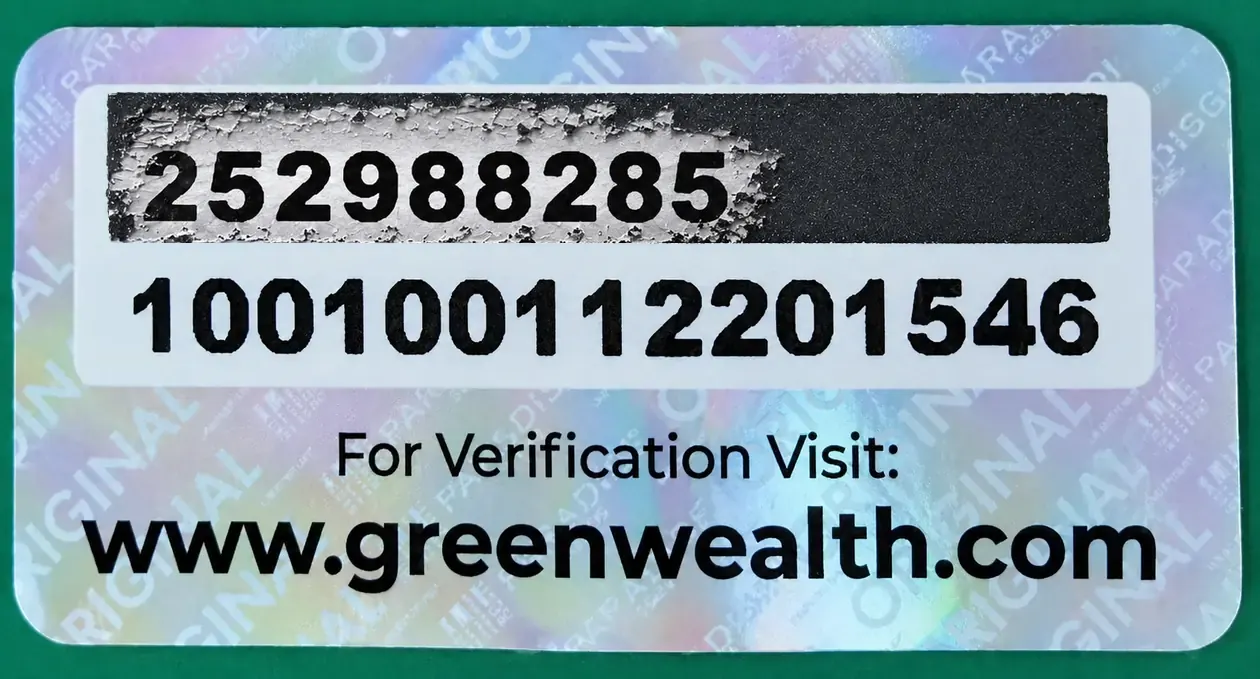 Genuine Green Wealth Neo Hair Lotion holographic authenticity sticker: the black scratch-off panel, partly scratched to show how the 12 digit verification code appears underneath, with the printed public serial number below